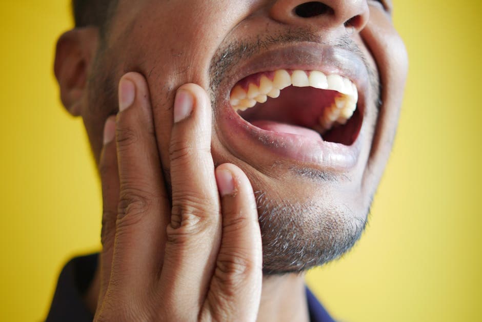 Person experiencing tooth pain